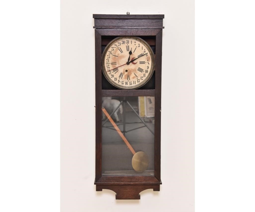 Oak-faced calendar wall clock.
36.5"h