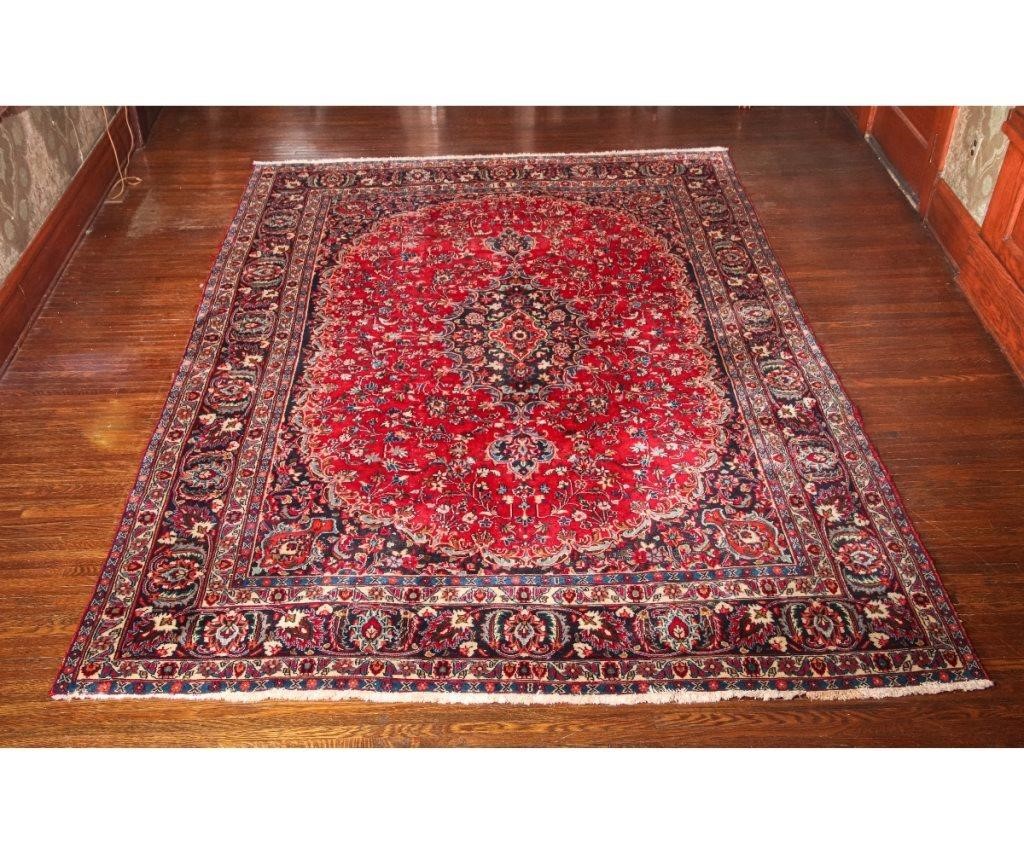 Persian room size carpet with red