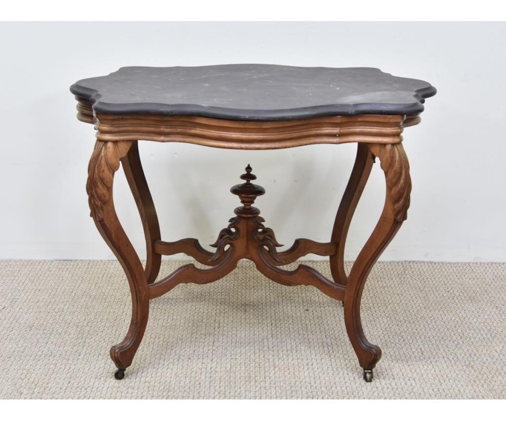 Victorian carved walnut table with