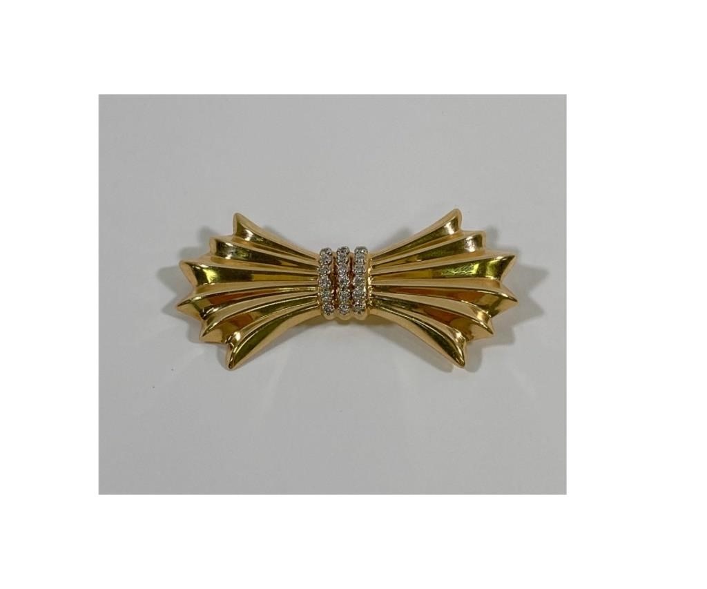 14kt gold bow tie pin with 18 brilliant