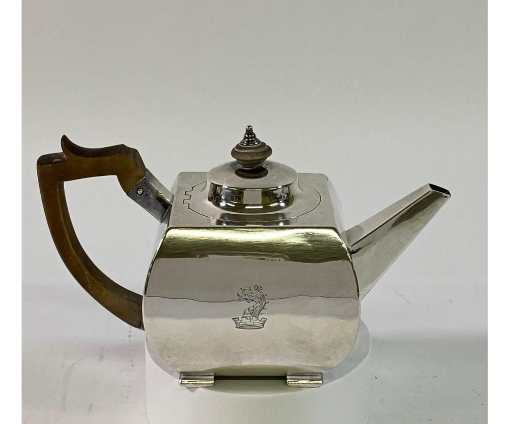 English silver teapot with armorial