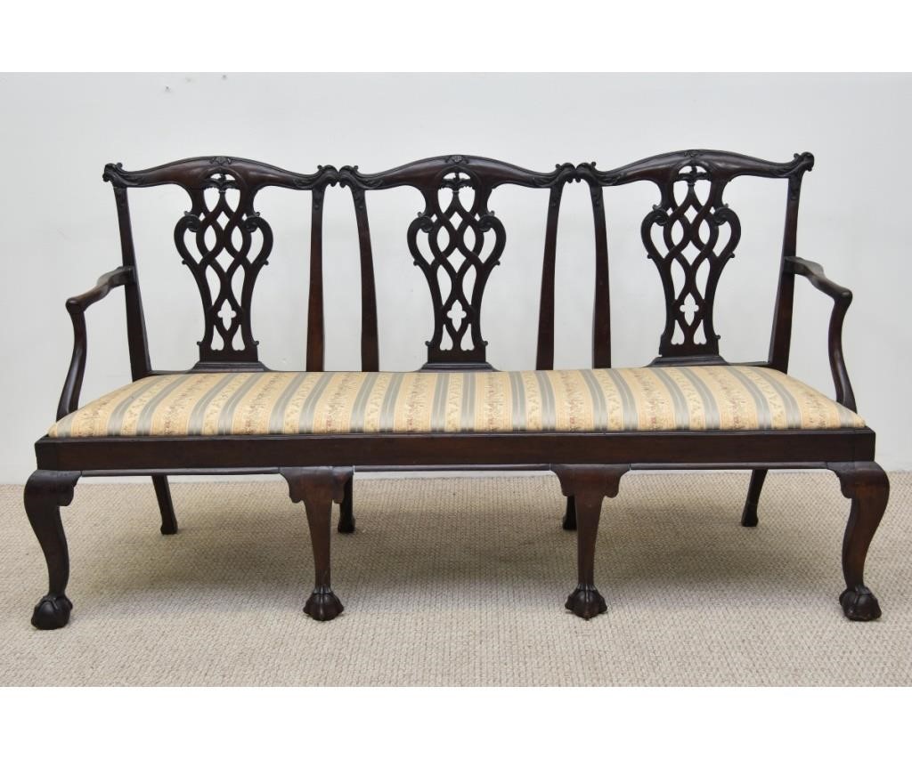 Carved mahogany Chippendale triple