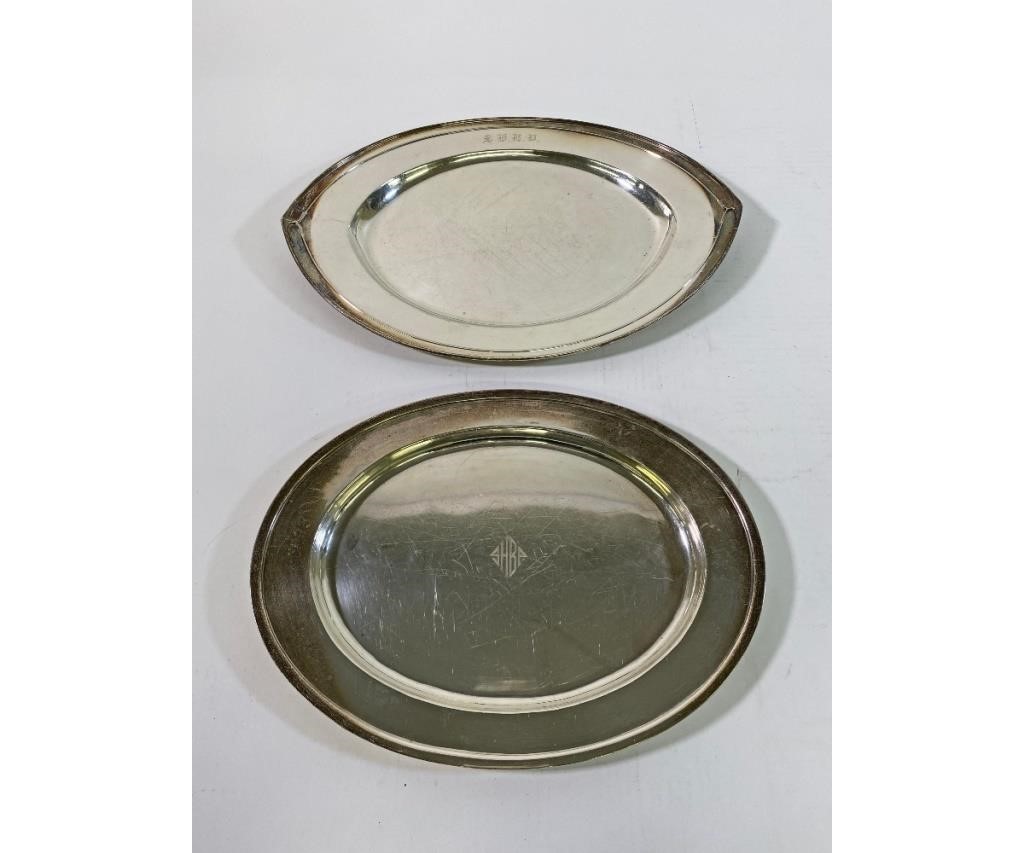 Two sterling silver trays, larest