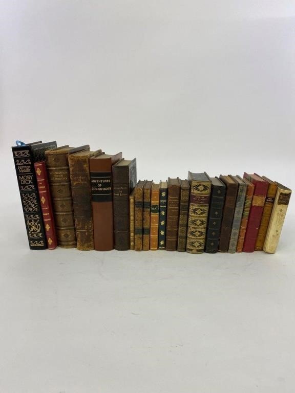 21 volumes of leather bound books