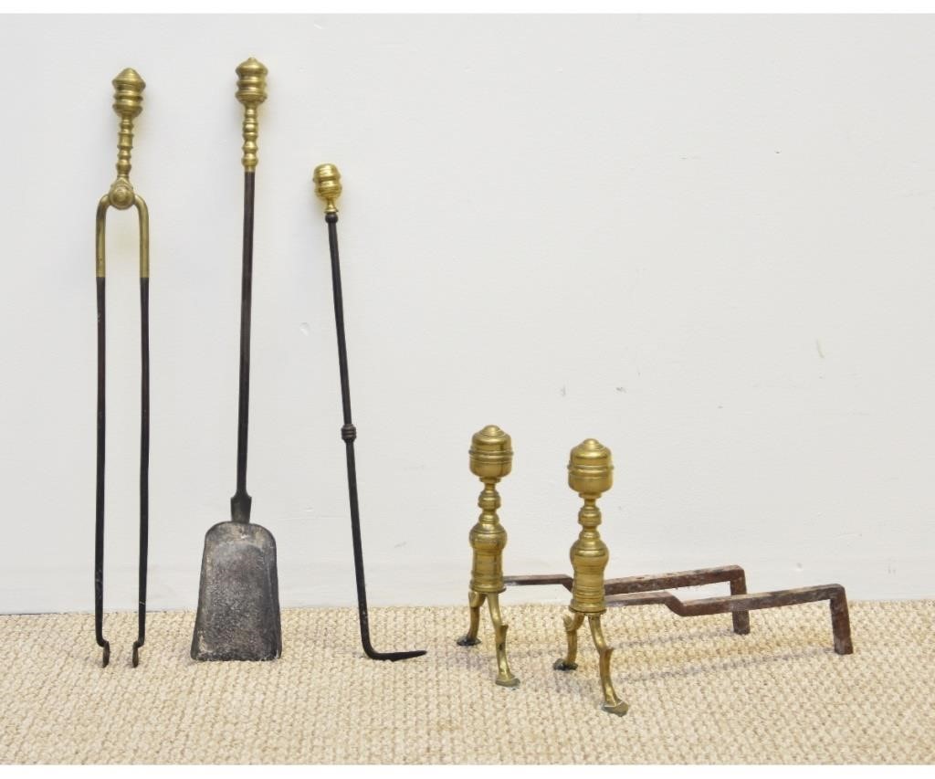 Delicate pair of brass andirons,