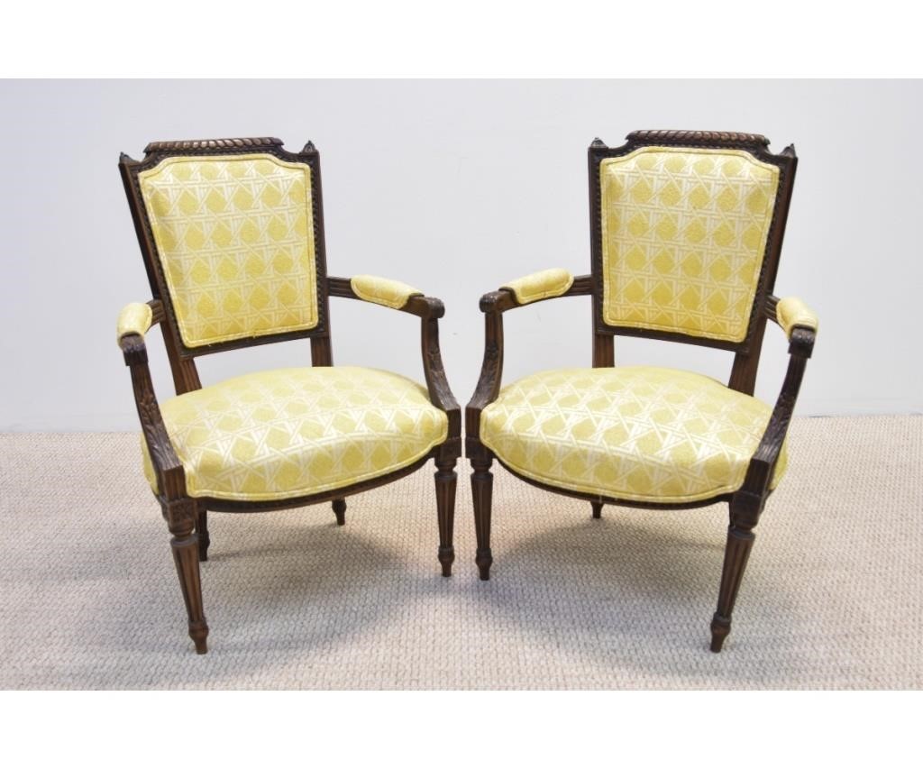Pair of French walnut open armchairs  28b3ae