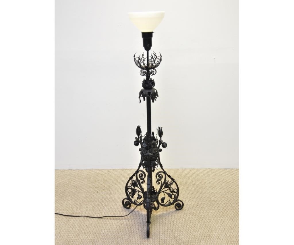 Ornate wrought iron standing torchiere