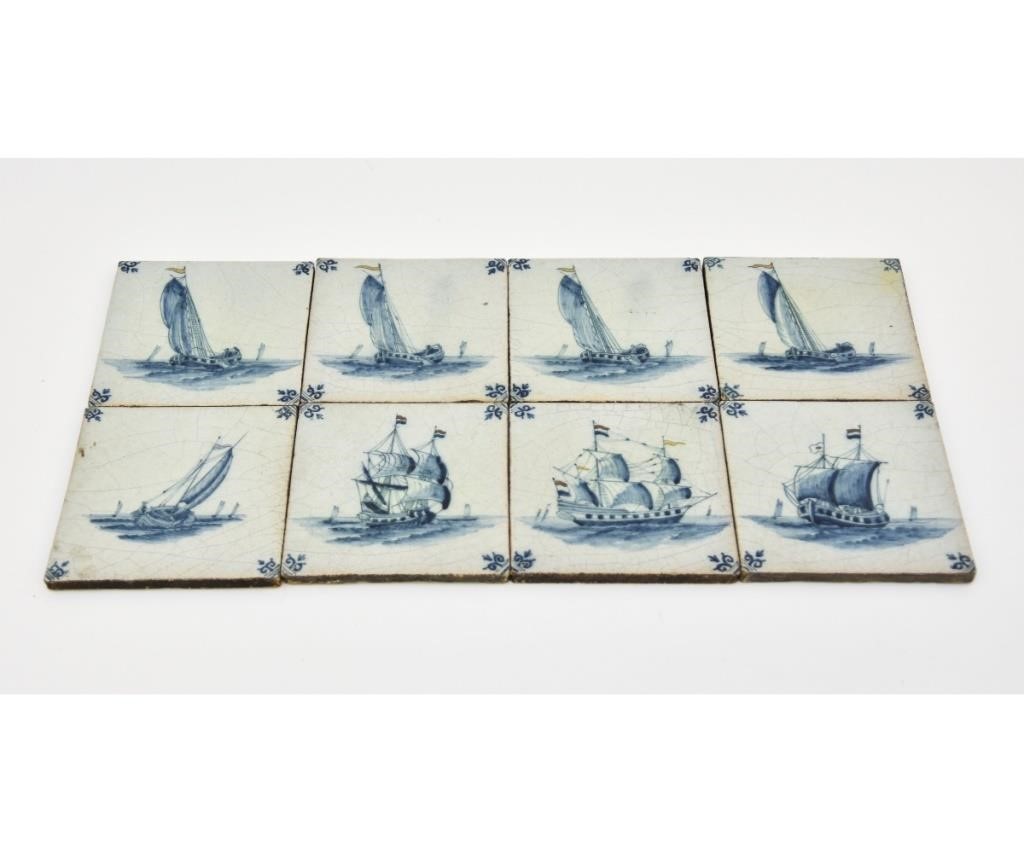 Four matching Delft ship tiles;