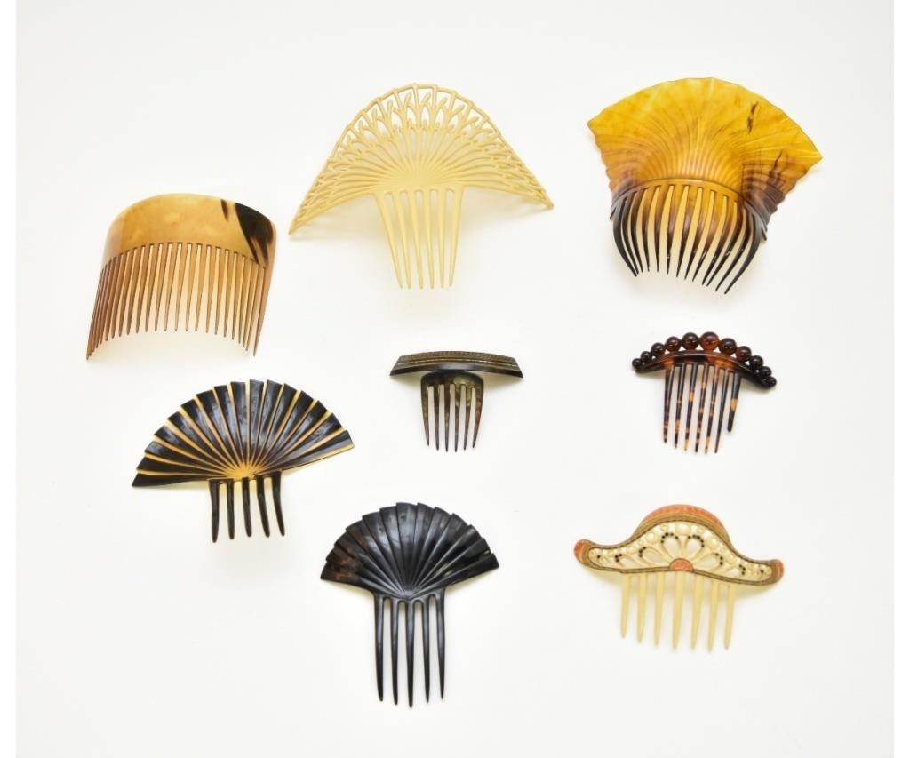 Eight celluloid/plastic hair combs