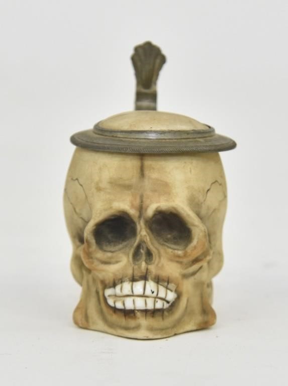 Small German porcelain skull stein