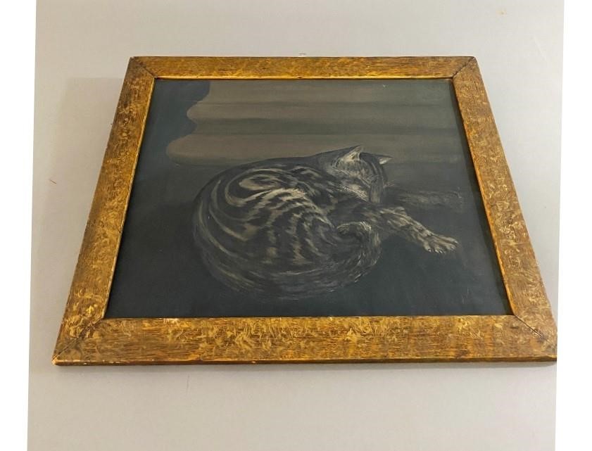 Oil on canvas of a recumbent cat,