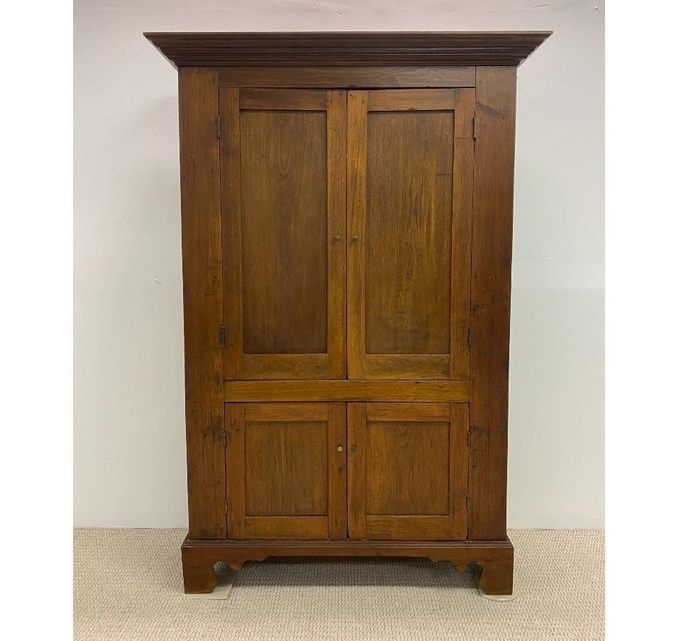 Walnut cupboard, early 19th c., with