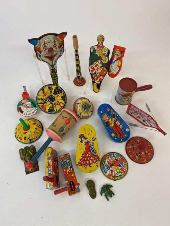 Tin noise makers including a clown,