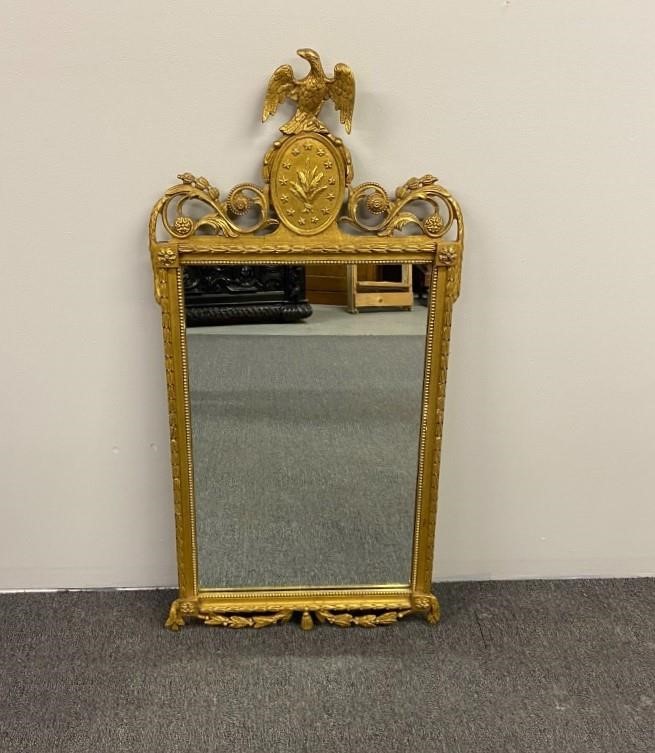 Gilt mirror with eagle finial and