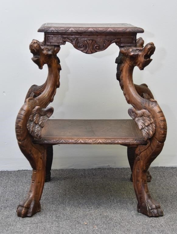 Continental walnut table with carved