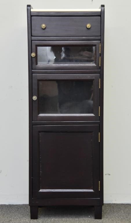 Mahogany colored dentil cabinet,