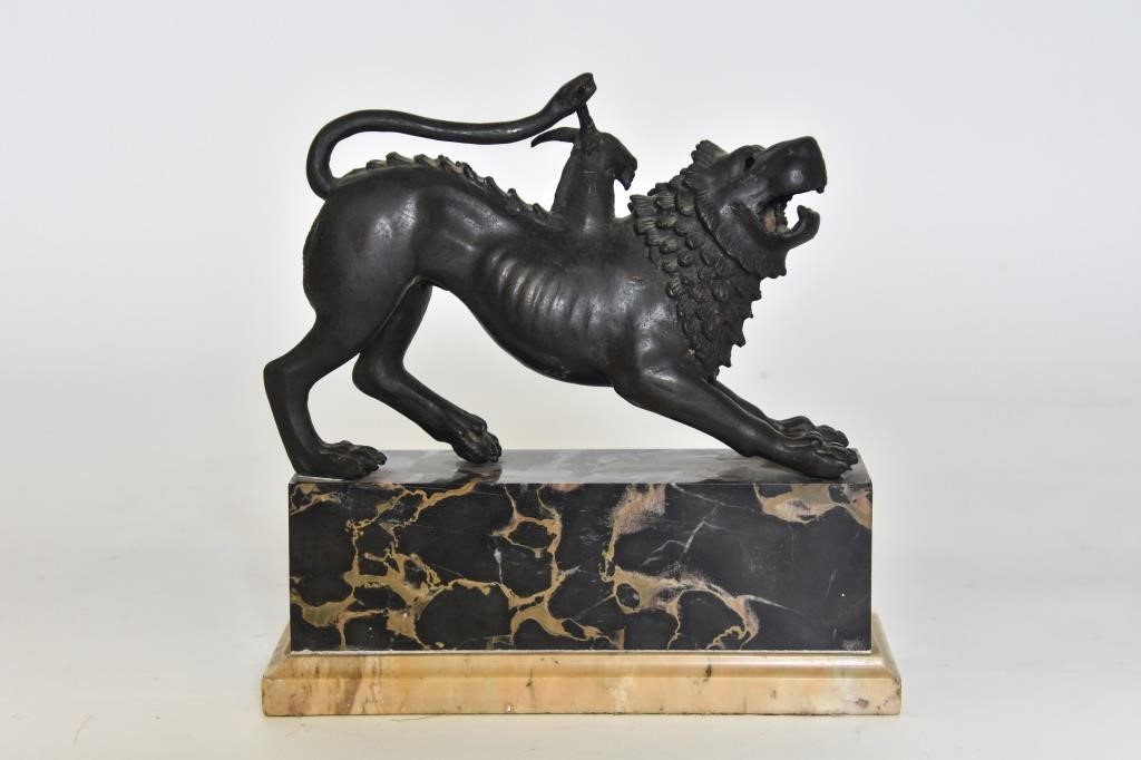 Bronze lion figure mounted on a