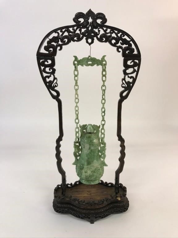 Carved jade hanging covered vase