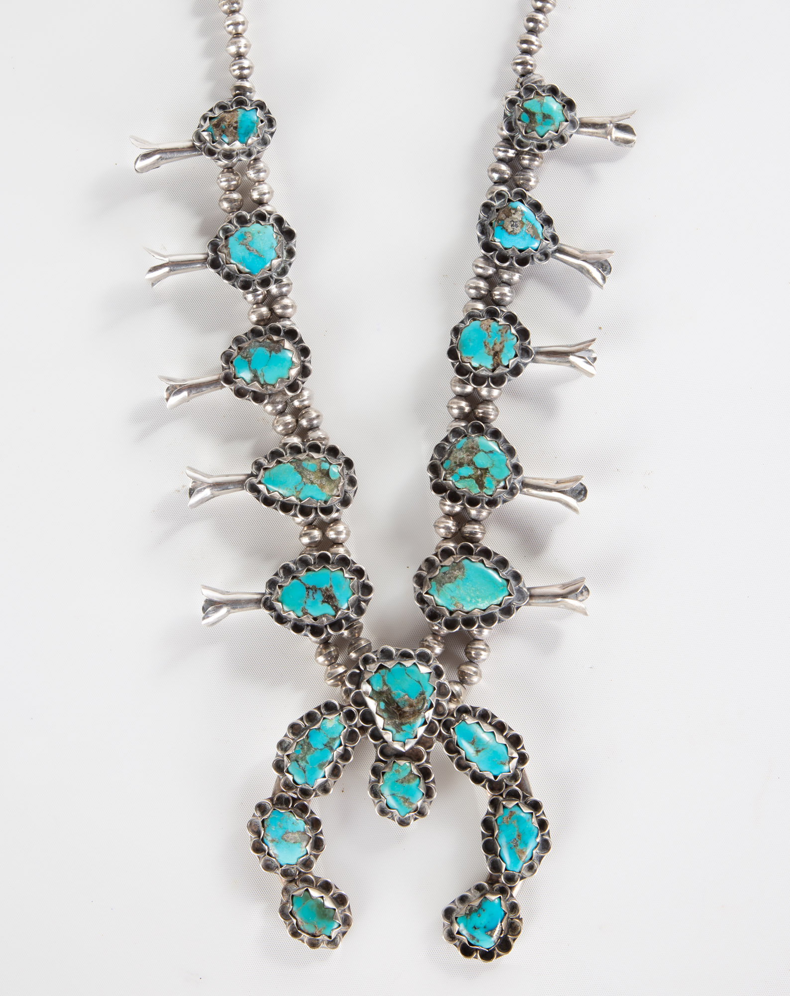 SILVER & TURQUOISE SQUASH BLOSSOM