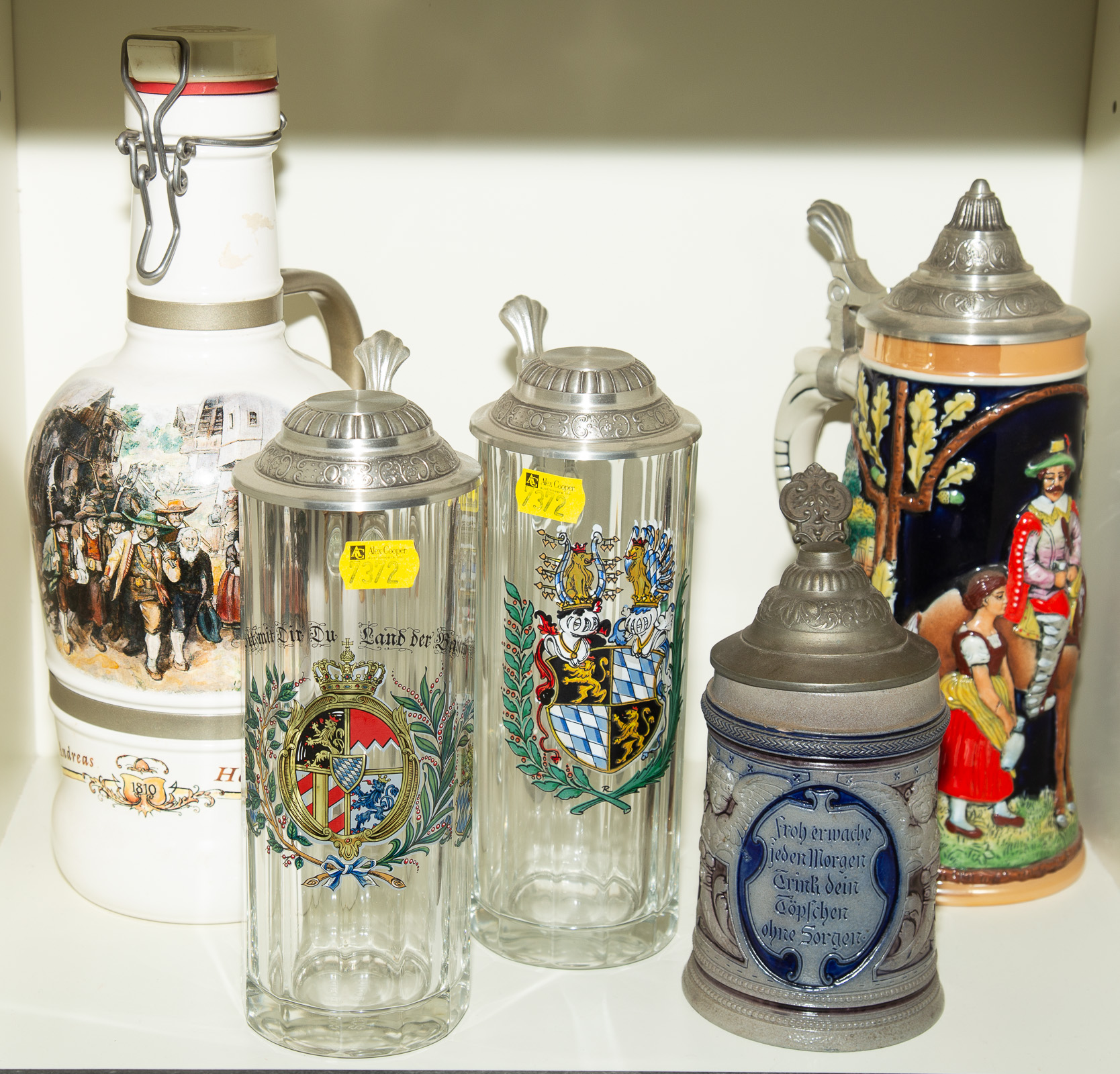 11 DECORATIVE BEER STEINS .