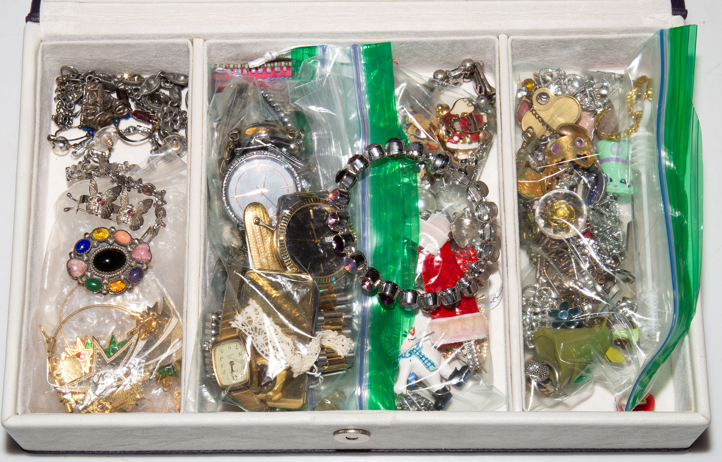 A BOX OF JEWELRY Includes necklaces,