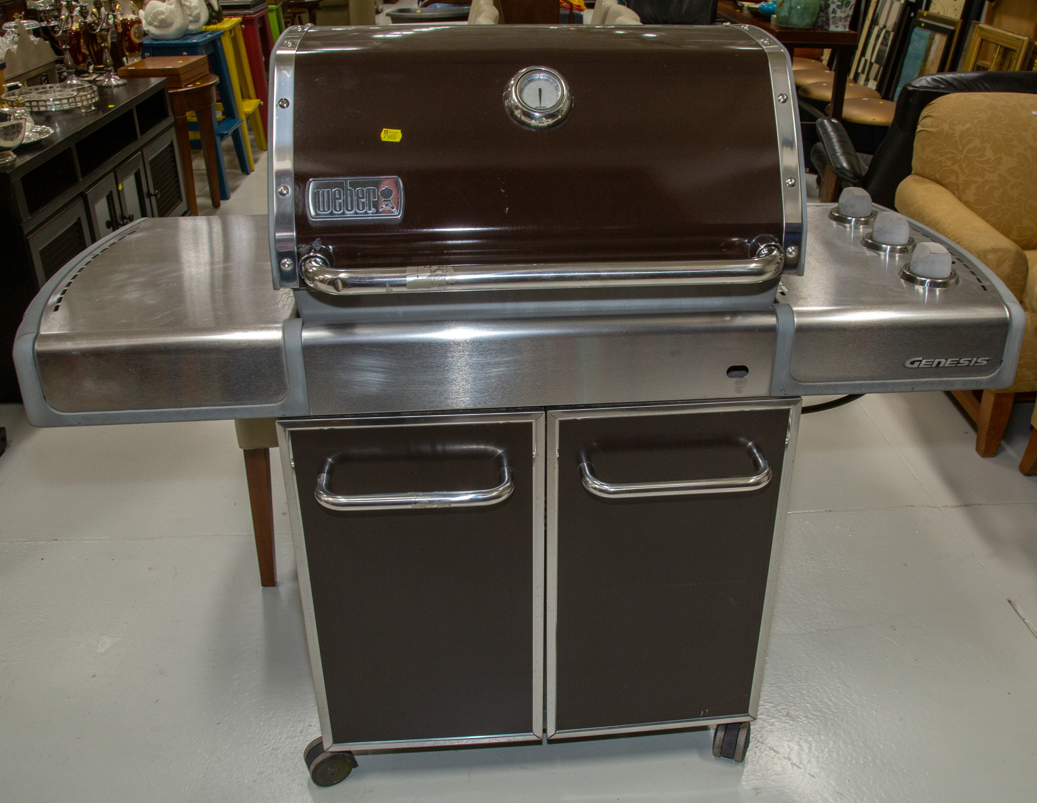 A WEBER "GENESIS" GAS GRILL .