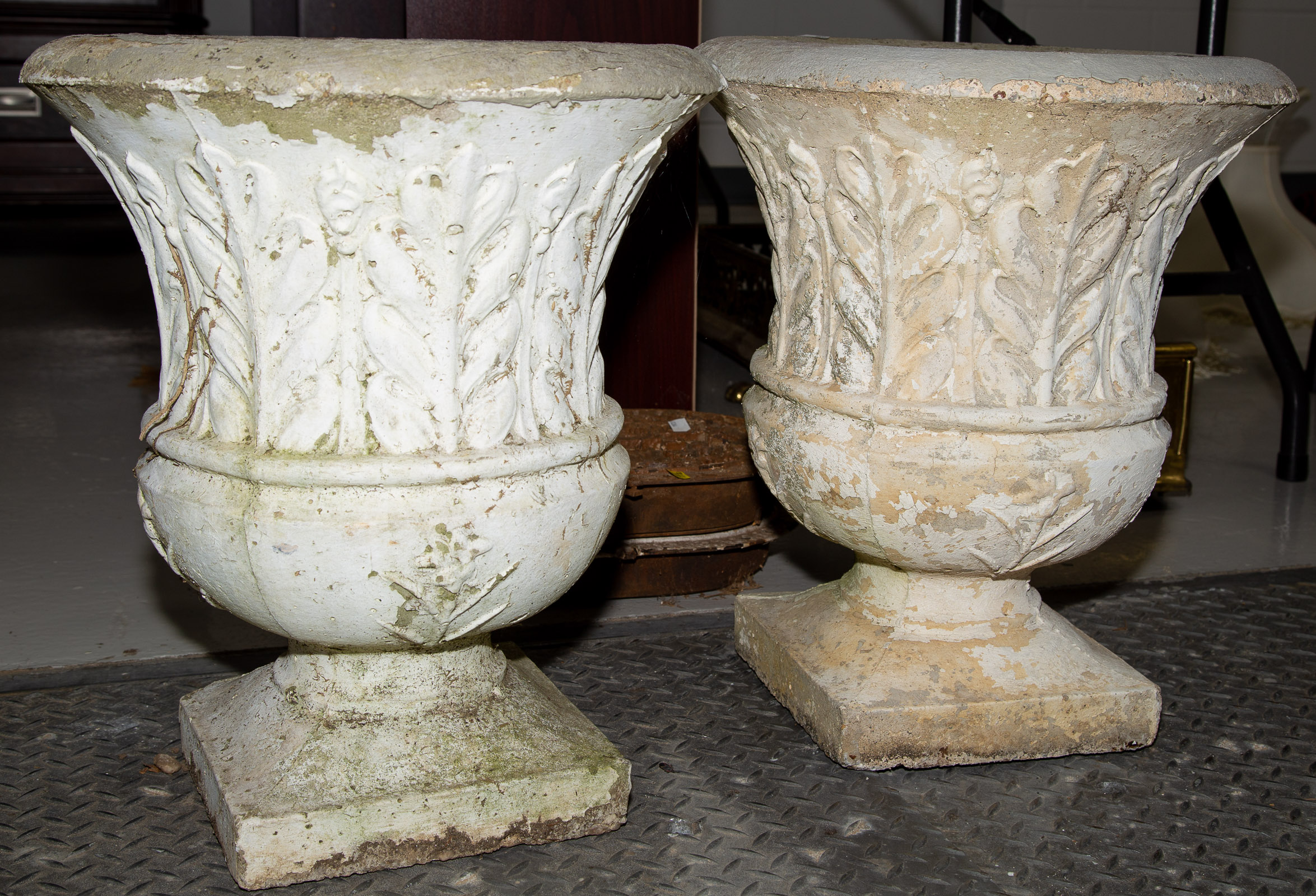 TWO CONCRETE GARDEN URNS Each 19 289823