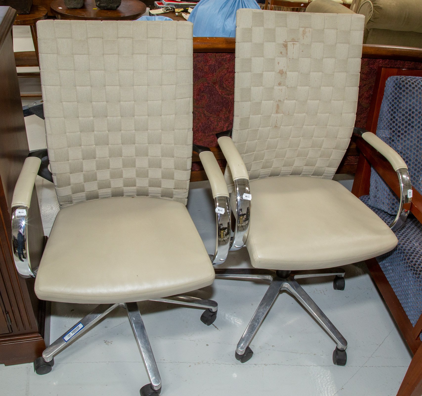 A PAIR OF MODERN DESK CHAIRS With chrome