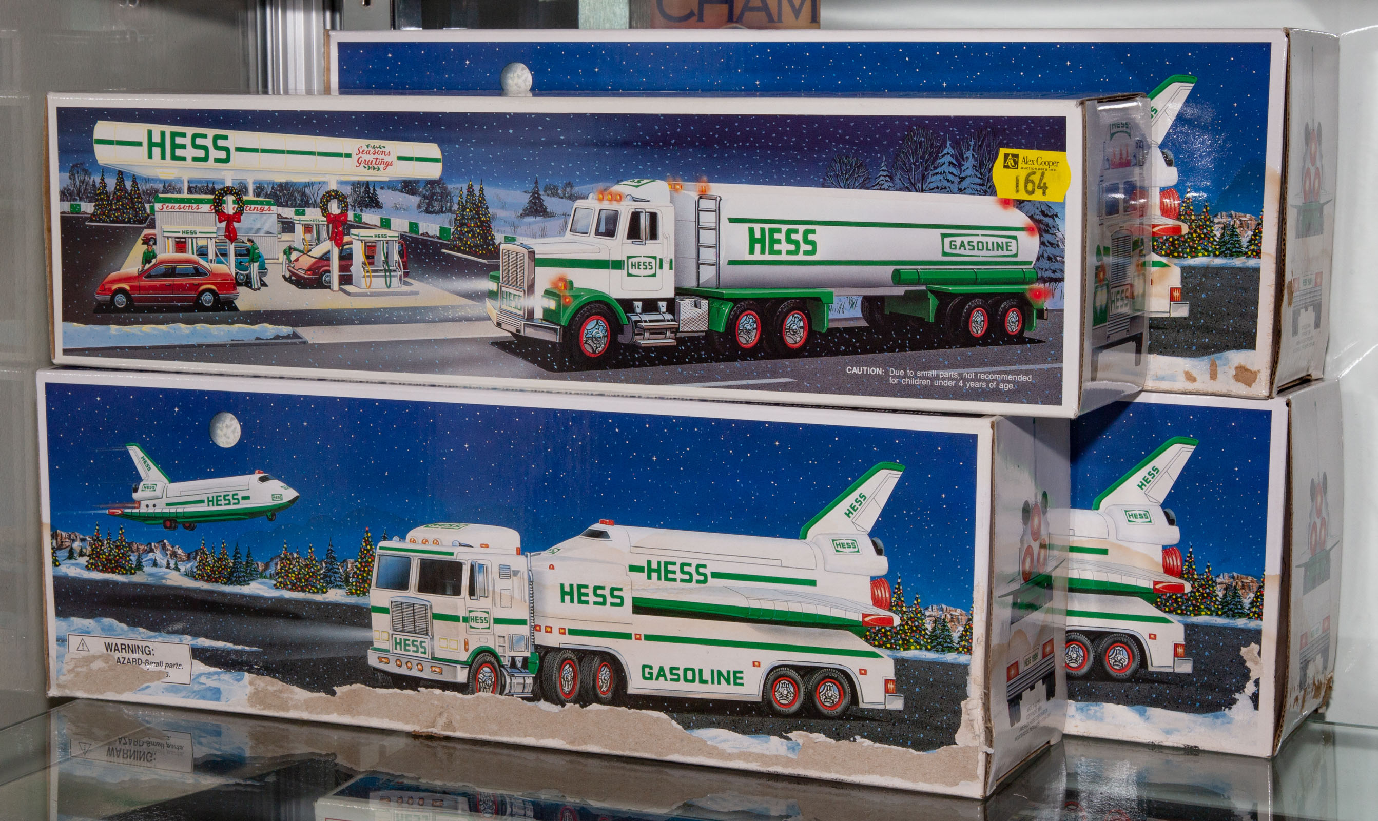 FOUR ASSORTED HESS TRUCKS One 1990 2898a2