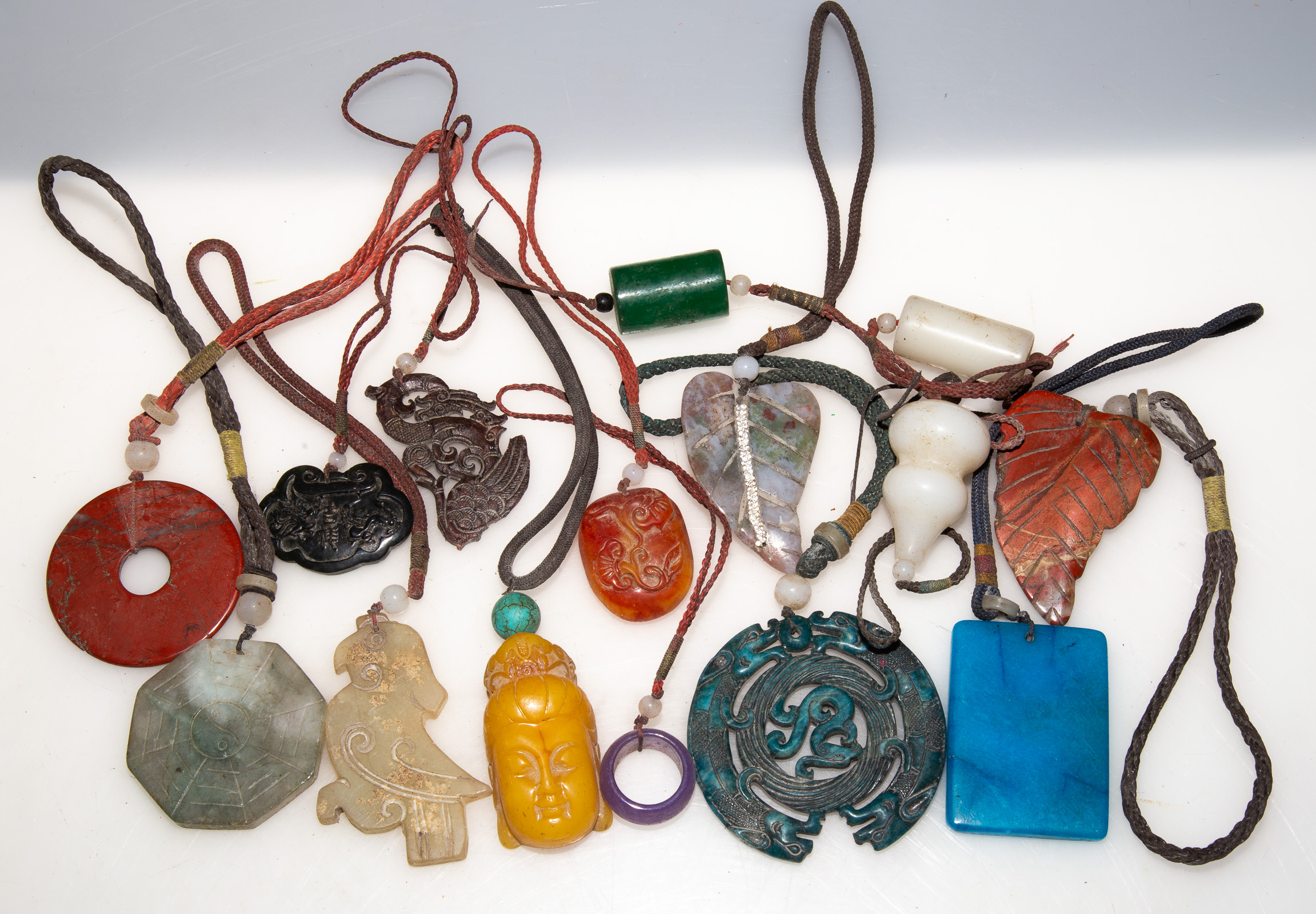 ASSORTED CHINESE CARVED STONE PENDANTS 289b15