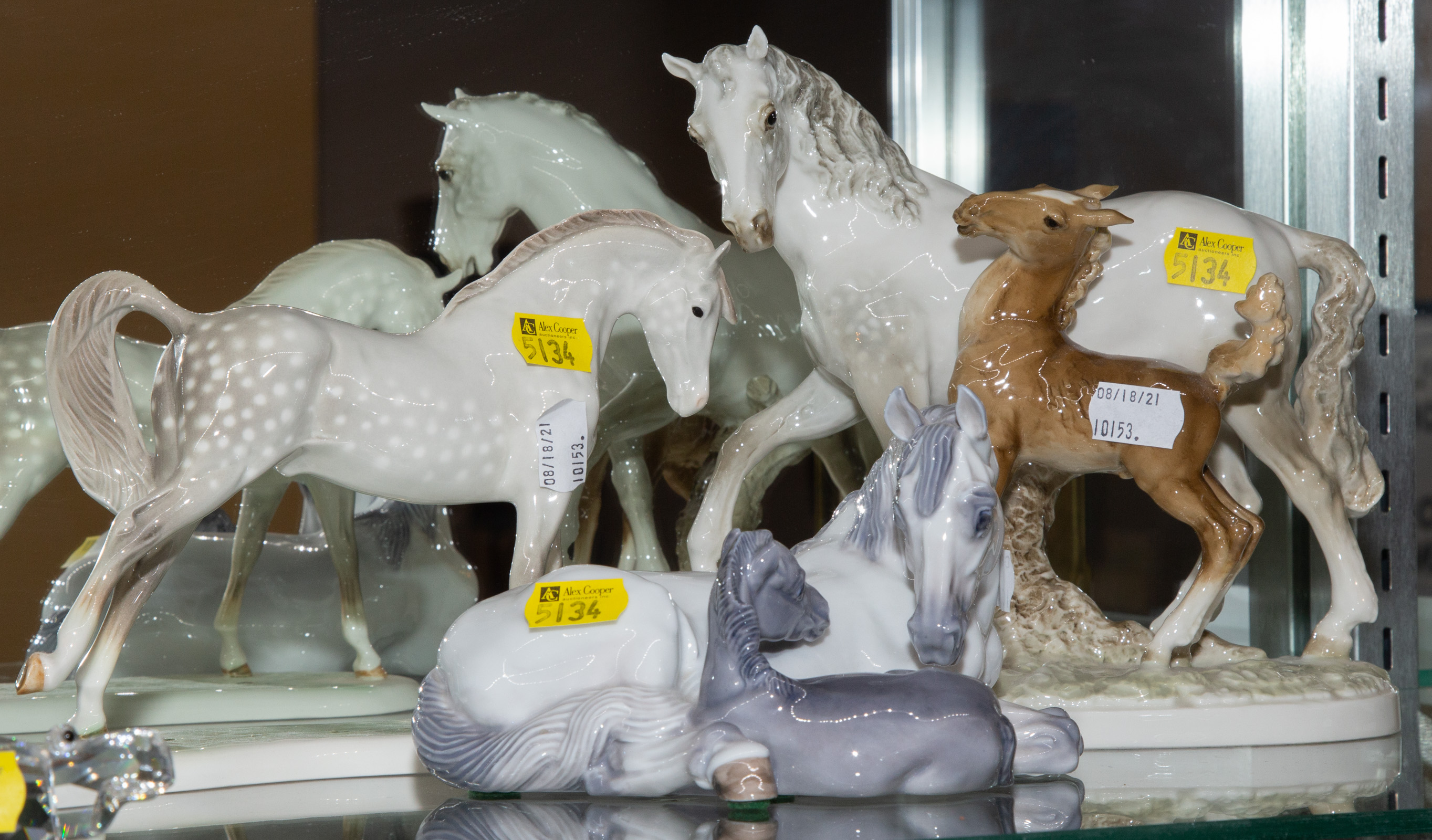 THREE PORCELAIN HORSE FIGURES Includes 289b43