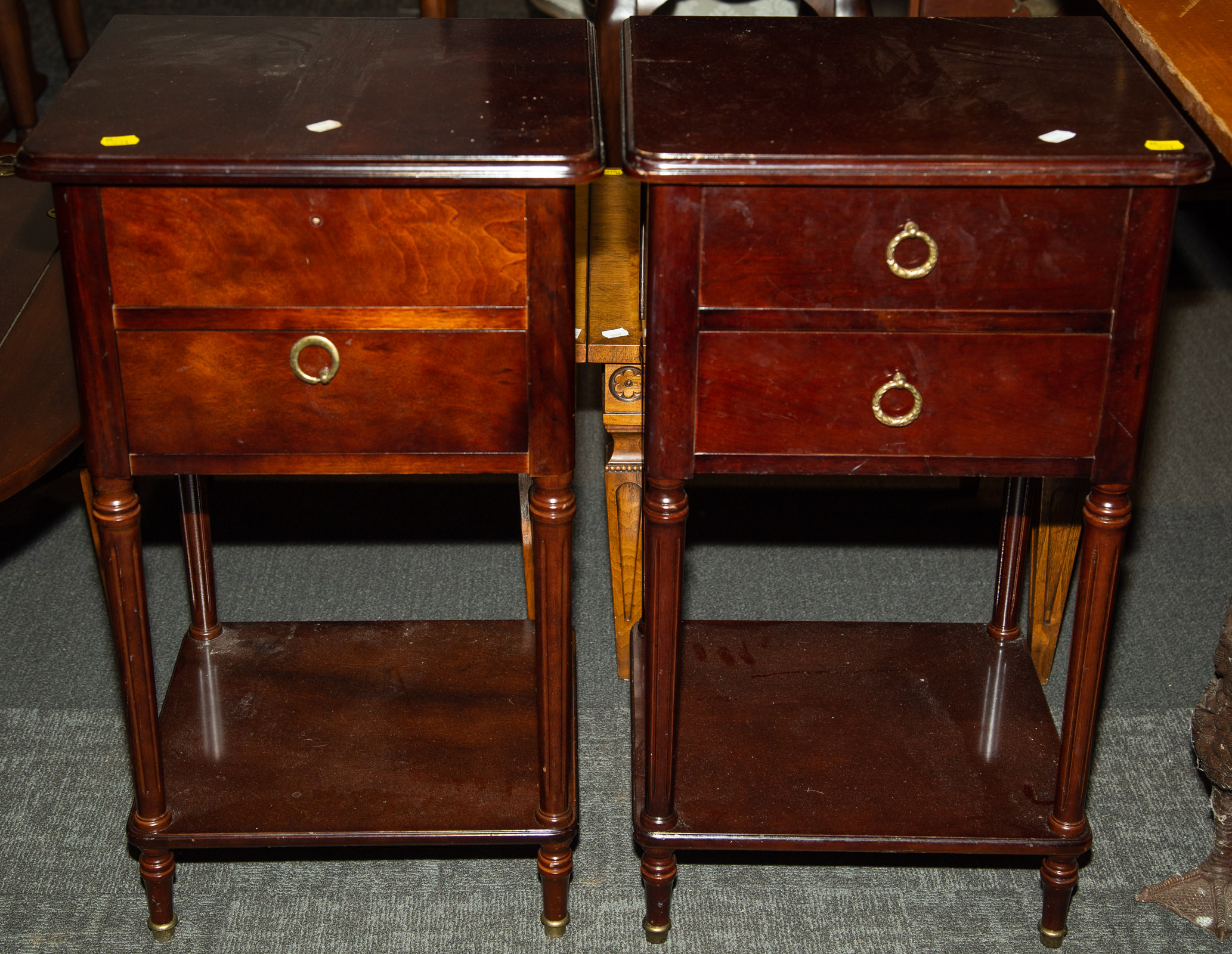 A PAIR OF MAHOGANY NIGHT STANDS 29 in.