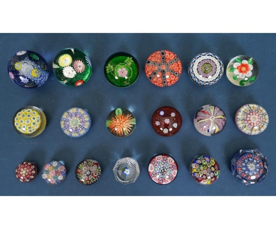 Nineteen glass paperweights some