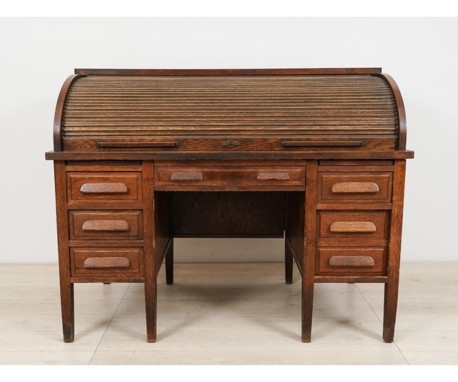 Oak roll top desk, circa 1900. 
44h