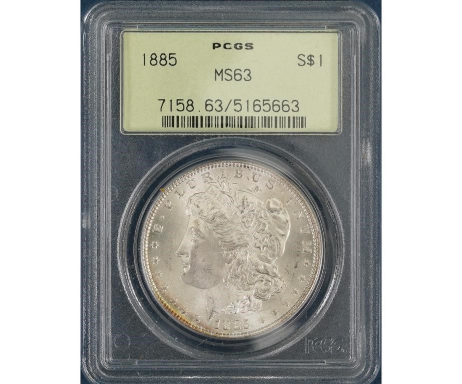 1885 Morgan silver dollar, MS63.