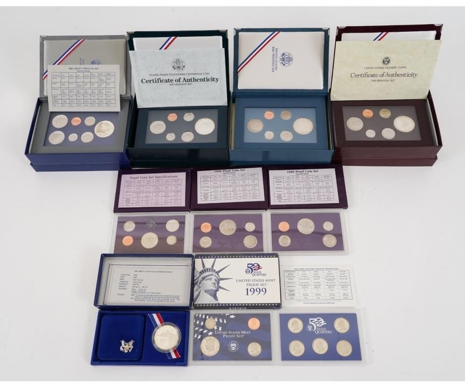 Nine boxed cased coin proof sets Condition  28a107