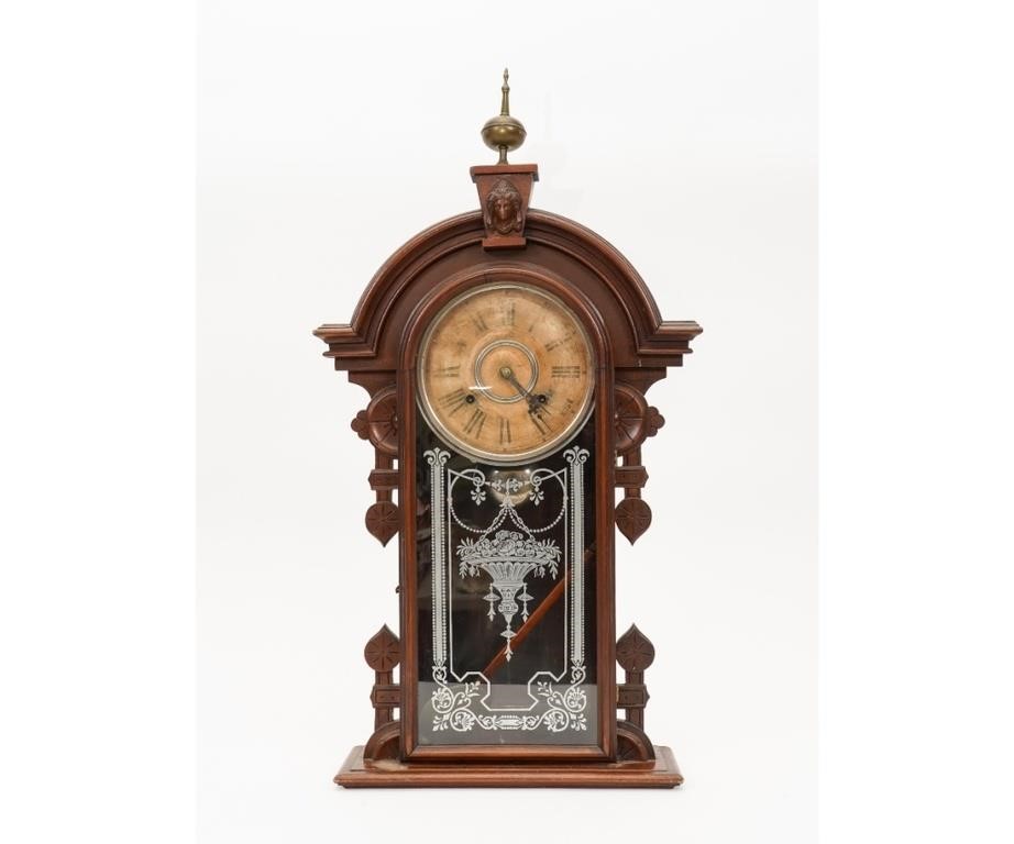 Victorian walnut mantel clock.
32"h