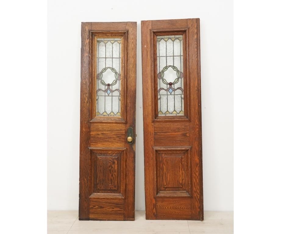 Pair of oak and leaded glass doors,