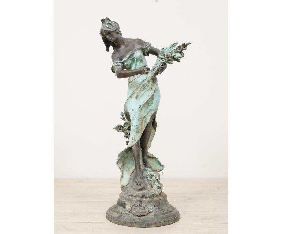 Faux bronze metal statue of a lady 28a1fc