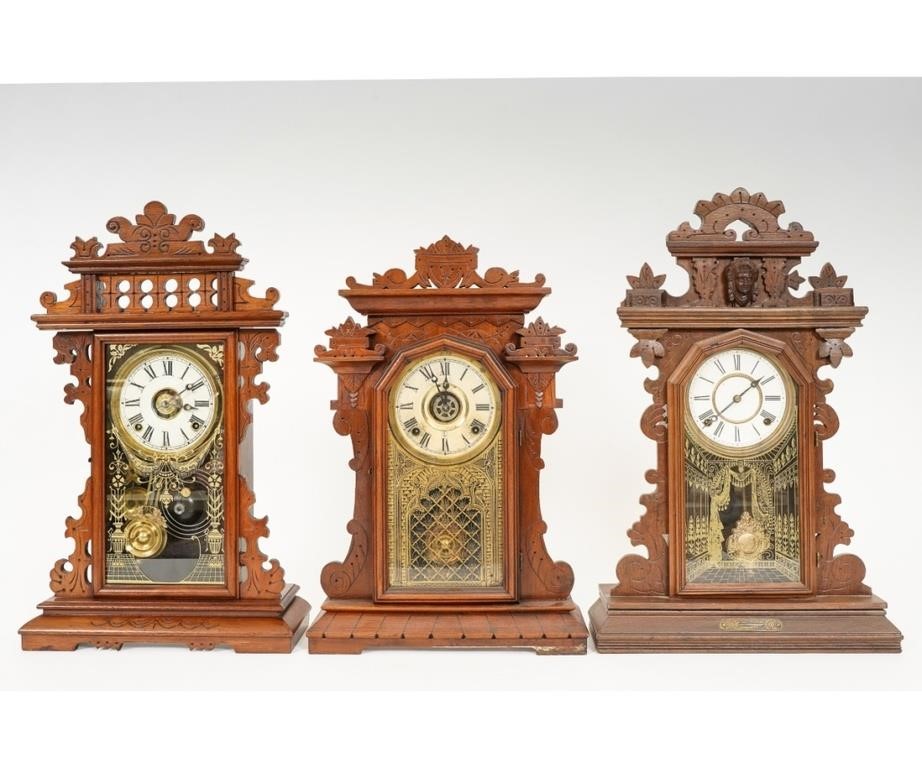 Three walnut mantel clocks by unknown