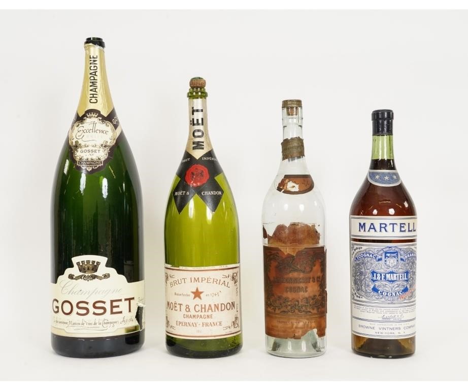 Four vintage bar top liquor bottles