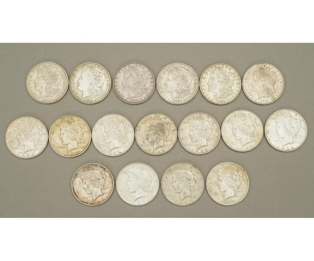 Six 1921 Morgan silver dollars;