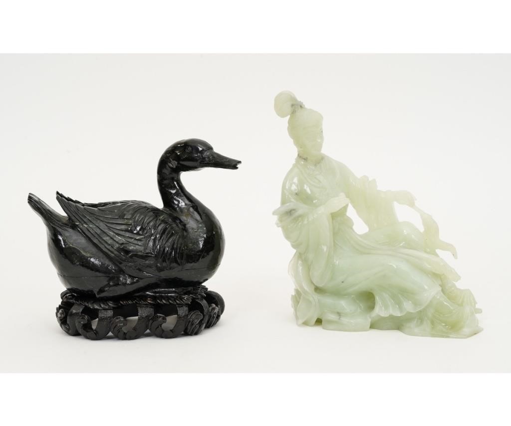 Two carved Chinese figures, a black