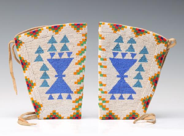 A PAIR OF PLAINS BEADED GAUNTLETS