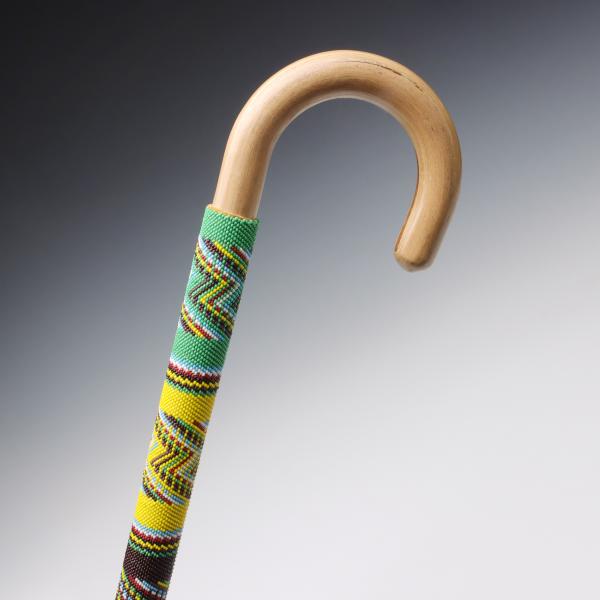 A BEADED CANE ATTRIBUTED AS NATIVE