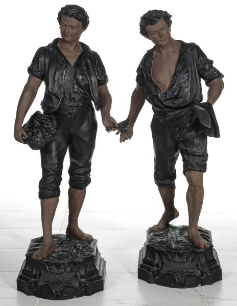 A PAIR 44-INCH SPELTER FIGURES SIGNED