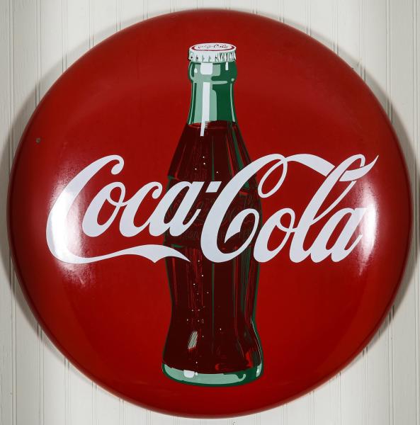 A 24-INCH COCA-COLA BUTTON SIGN WITH