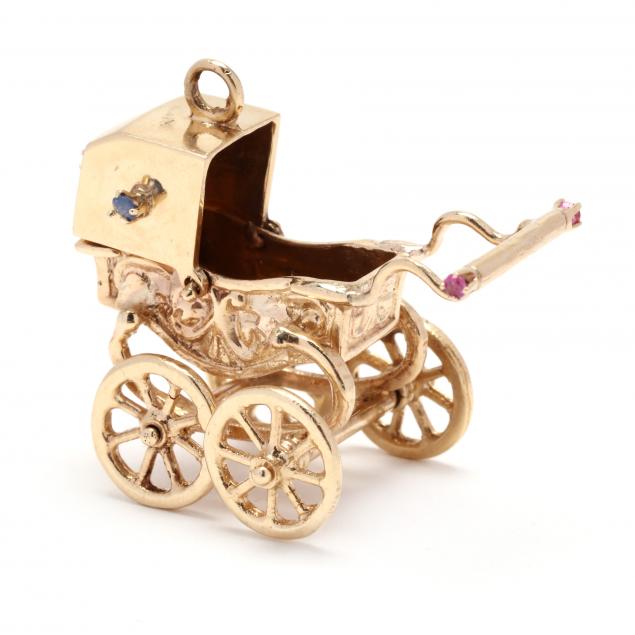 GOLD AND GEM-SET BABY CARRIAGE