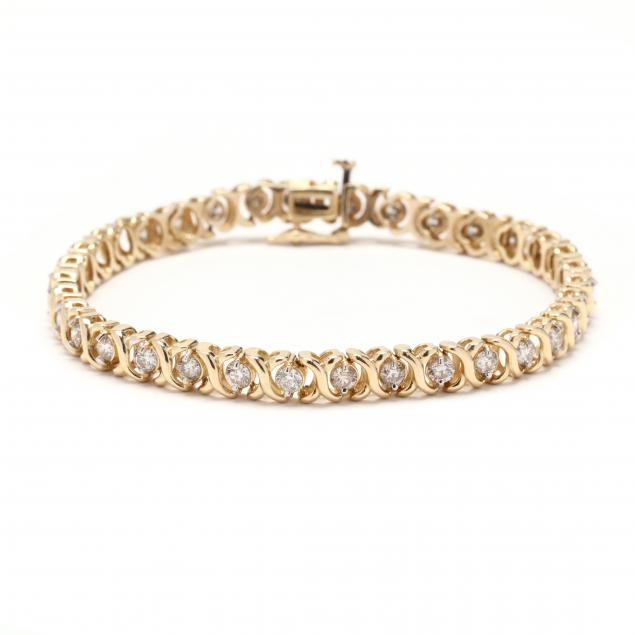 GOLD AND DIAMOND BRACELET Designed