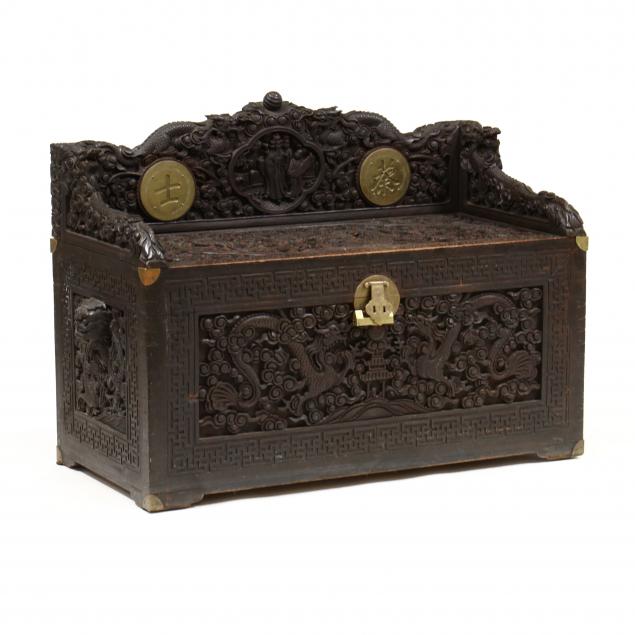 AN EXCEPTIONAL CHINESE CARVED STORAGE